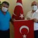 Çöpteki bayrağı çıkaran temizlik işçisine altın